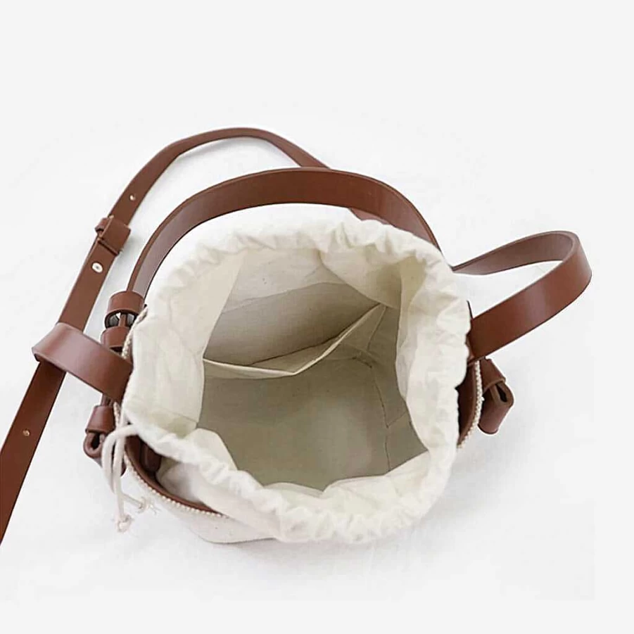 Women's Sac Bandoulière Egg Shell Canvas and Leather Bucket Bag